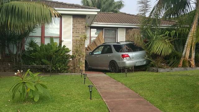 A reportedly stolen car has crashed into a home on Blackbutt Way, Barrack Heights following a police pursuit. 
