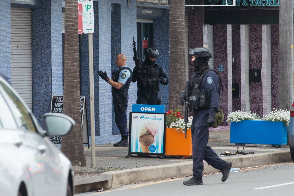 The alleged hostage siege situation prompted a large police response with officers (pictured) arriving quickly to the scene.