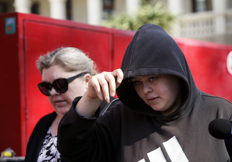 Windang's Sarah Good, supported by her mother, was released on bail at Wollongong Local Court. Picture: Anna Warr