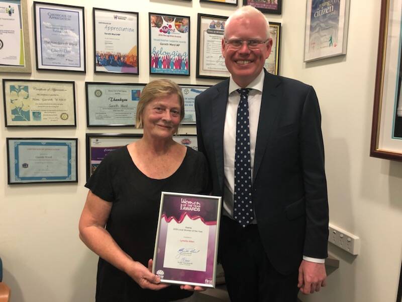 Kiama MP Gareth Ward presented Lynne Allen with her award on Friday. Picture: Supplied