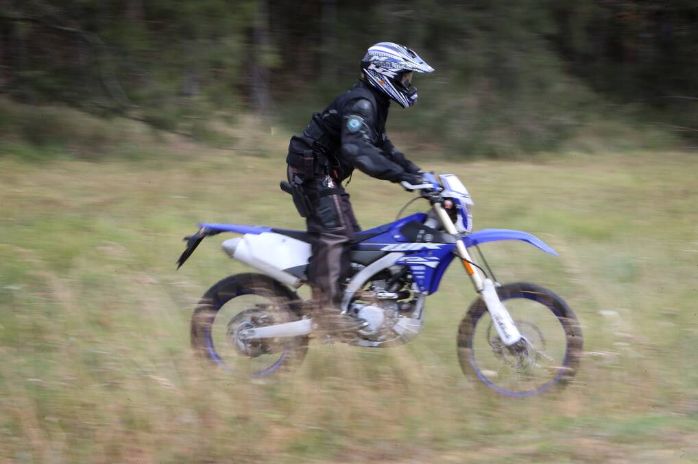 Wollongong and Lake Illawarra police, including Senior Constable Carl Dyson, are always targeting illegal trail bike riding. Picture: Sylvia Liber
