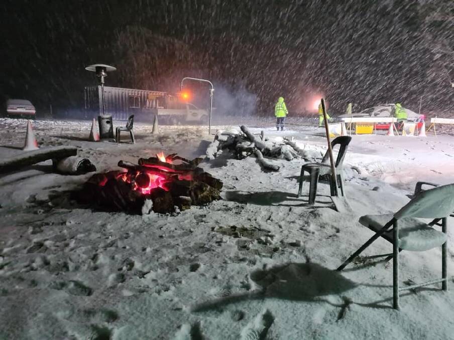 Chairs, cones and an outdoor heater were covered in snow. Picture: Lake Illawarra Police District