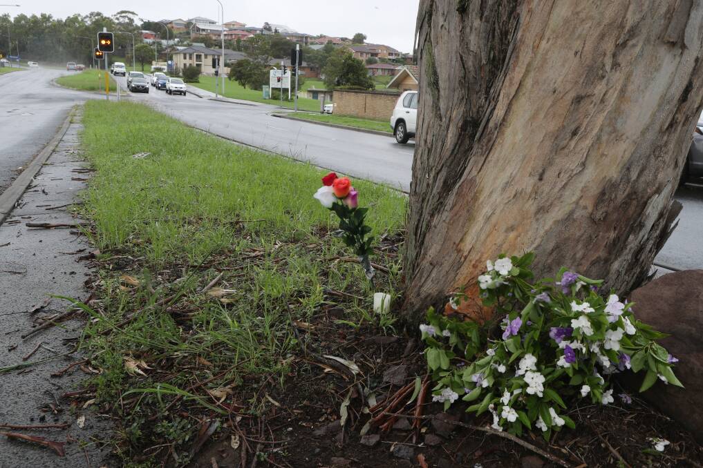A small memorial was set up on Wattle Road, Shellharbour near the scene of the accident. Picture: Robert Peet
