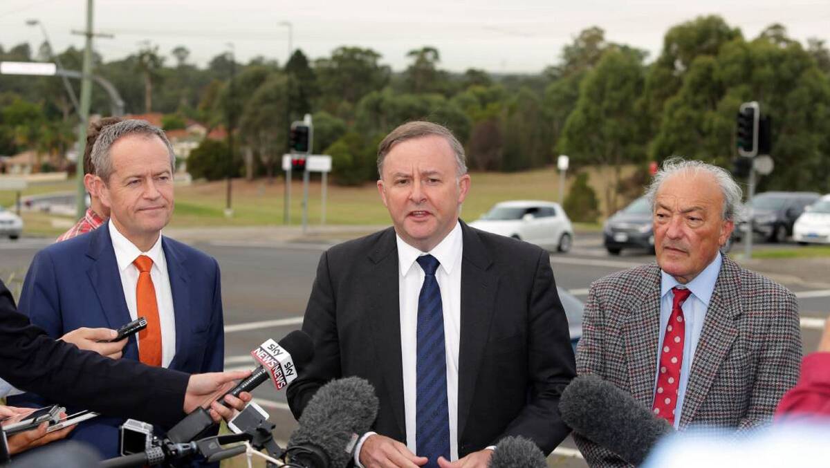 Federal opposition leader Bill Shorten, transport spokesman Anthony Albanese and Labor's Macarthur MP Dr Michael Freelander when they announced $50m for Appin Road in 2017. Picture: Chris Lane