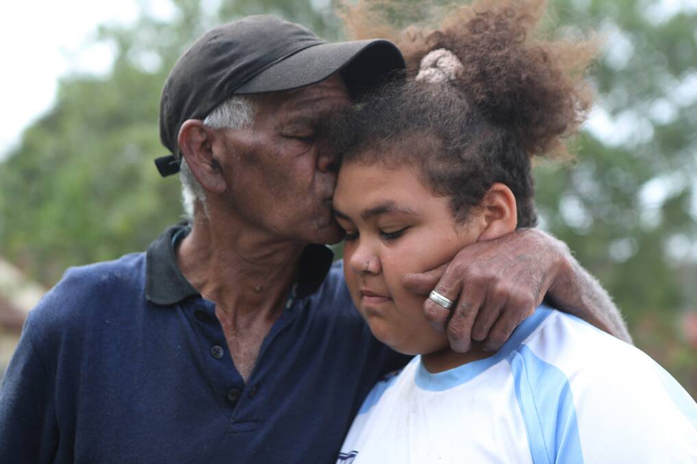 Fred Tallis comforts his daughter Khayne after the death of Shaye. Picture: Robert Peet