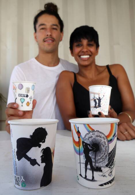 Blaise Gassin and Sarika Gupta with their coffee cup which aims to break down the stigma around domestic violence. Picture: Robert Peet