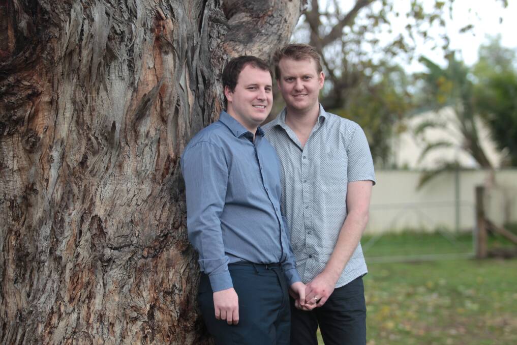 Sean Duffy and Dane Coulter are excited for the future. In a few months, their surrogate will be implanted with an embryo. Picture: Simon Bennett