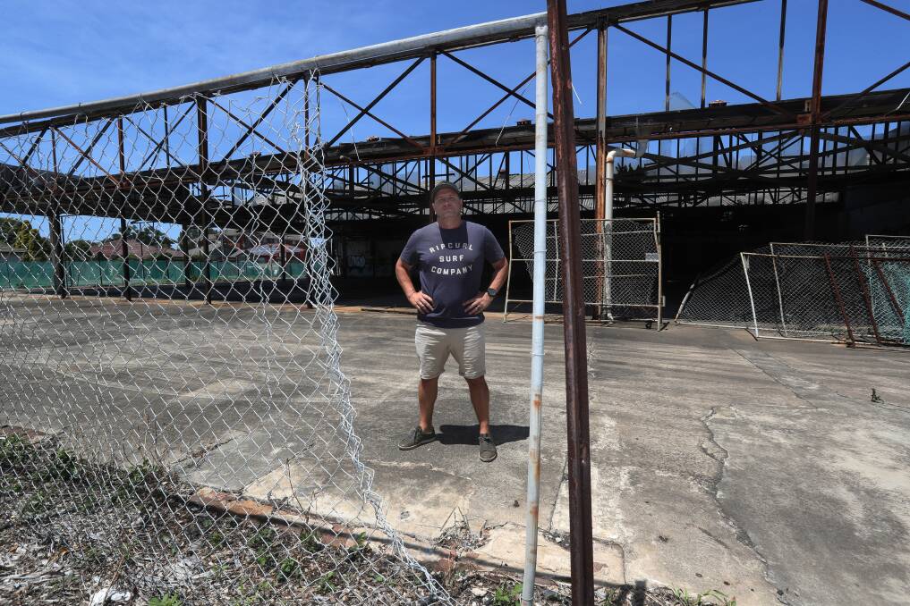 Unslightly structure: Scott McRae is "sick to death" of seeing a derelict building in Fairy Meadow and wants it demolished. Picture: Robert Peet