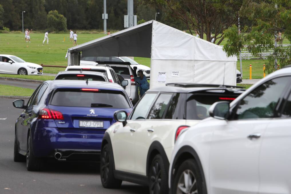 There was an almost two-hour wait at Shellharbour's drive-thru testing clinic on Sunday morning. Picture: Sylvia Liber