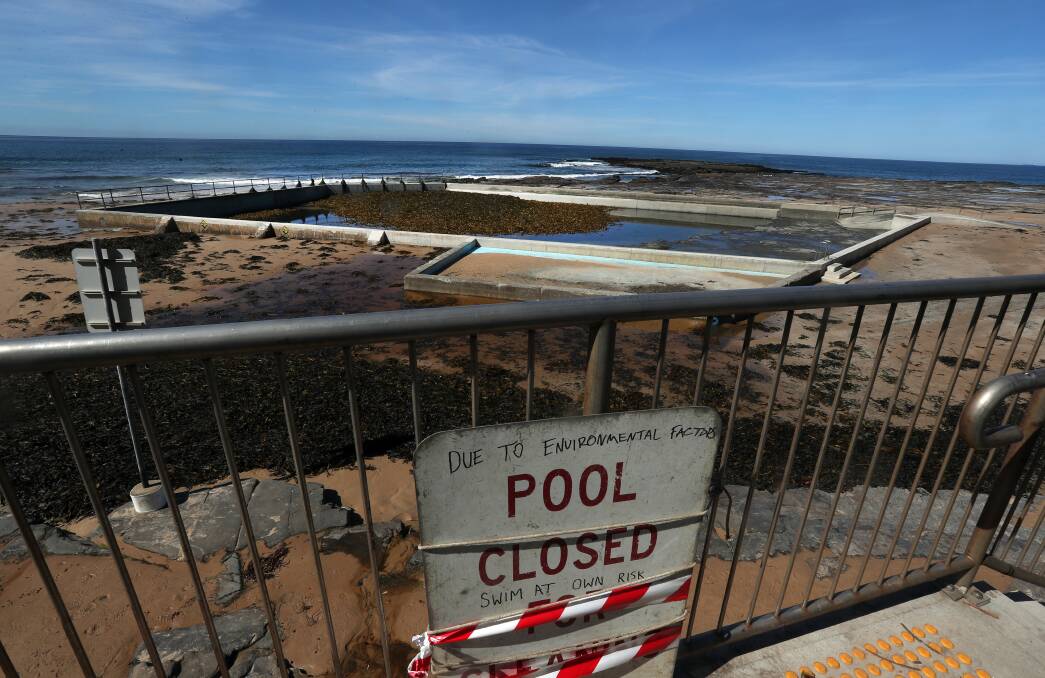 Seaweed has been dumped into Wombarra Rock Pool prompting Wollongong City Council to close the popular swimming spot. Picture: Robert Peet