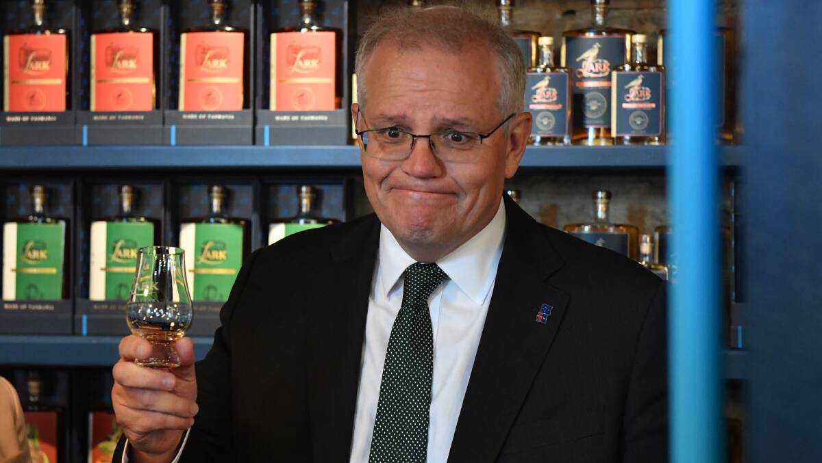 Scott Morrison visits Lark Whiskey in the marginal seat of Lyons in Tasmania. Picture: AAP