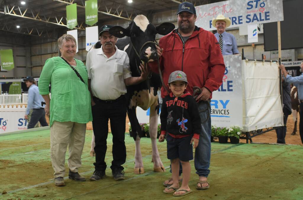Volume buyers including top-priced Holstein at $21,000 were Christine and Geoff Peatling, son Anthony and his son Sam, Katunga, Vic. Picture by Alastair Dowie