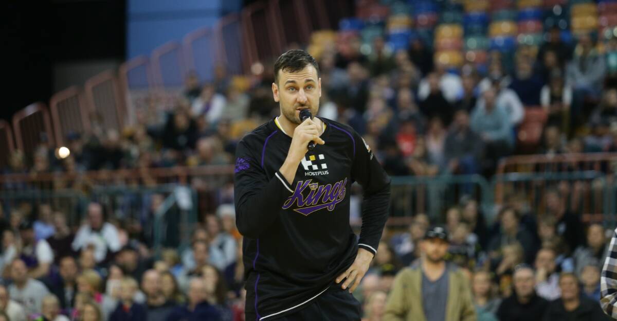 TOUGH CALL: Sydney Kings star Andrew Bogut informs the crowd at the Newcastle Entertainment Centre on Saturday that the game against the Illawarra Hawks had been cancelled due to the slippery state of the court. Picture: Jonathan Carroll.