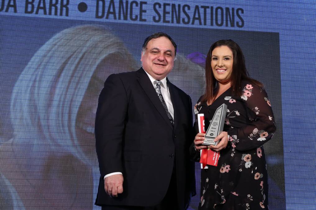 Reason to dance: Amanda Barr of Dance Sensations (right) won Business Person of the Year, presented by Steve Loe, Award's founder from Precedent Productions.