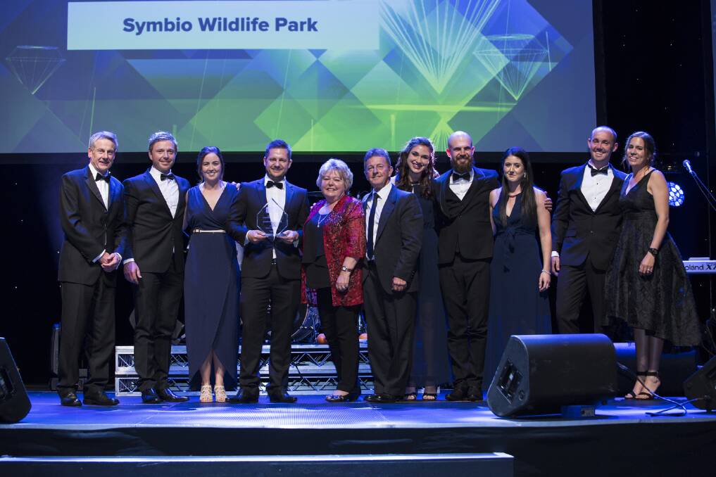 Best in business: The Symbio Wildlife Park team at the 2017 Illawarra Business Awards where the family run zoo picked up an amazing five awards as well as being named Illawarra Business of the Year.