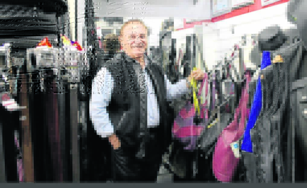 Owner Phillip Yalson of City Mode Leather with leather goods for sale: A tailor with over 40 years' experience, he can adjust and custom make clothing too.