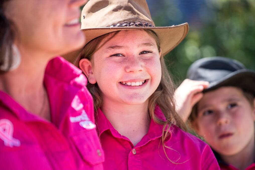 HAPPY TO HELP: A cheerful smile from a supporter at Pink Up Mudgee last year. Photo: McGrath Foundation