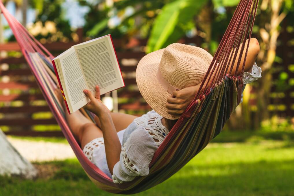 DELIGHT: There's not much better than spending a lazy summer's afternoon reading a page turner. Photo: Shutterstock