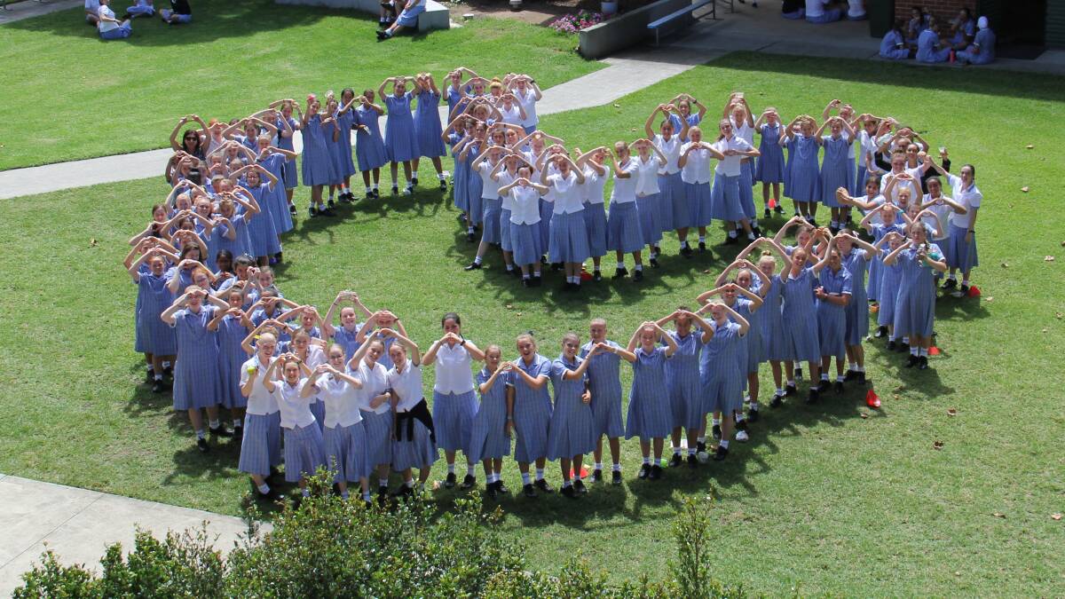 CARING: St Mary Star of the Sea College's Project Compassion theme this year is ‘Love Thy Neighbour’ and students have created their own ‘heart’.