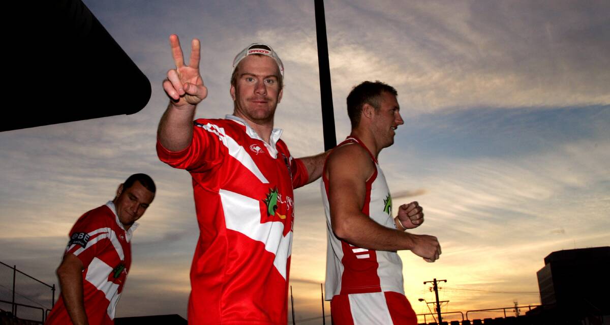 Life of the party: Lance Thompson heads out for Dragons training in Wollongong alongside Mark Gasnier in 2005. Picture: Craig Golding