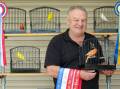 Bird breeder Johnny Walker shows off the birds that helped him to win Champion and Reserve Champion at the Sydney Royal Easter Show. Picture by Adam McLean