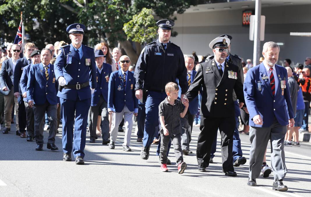 All the generations marched, some hand-in-hand. Picture by Robert Peet