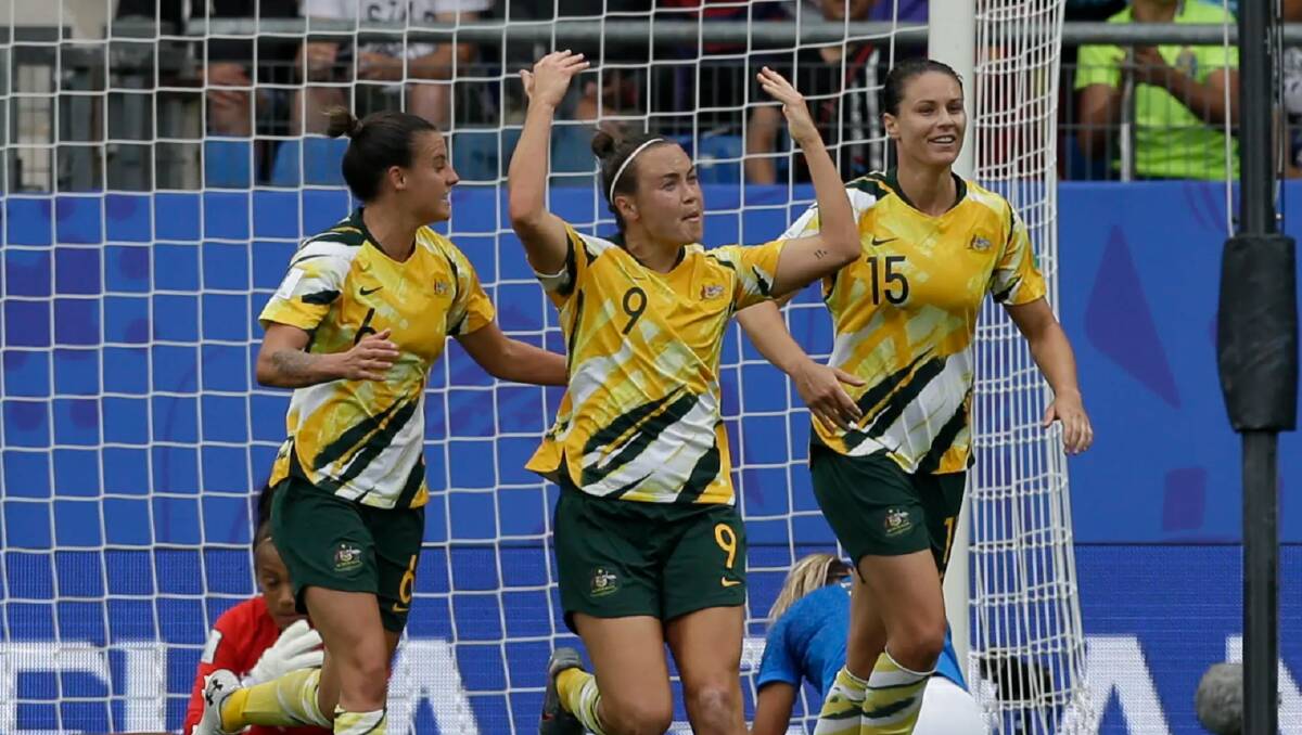 Caitlin Foord celebrates scoring Australia's first goal against Brazil.