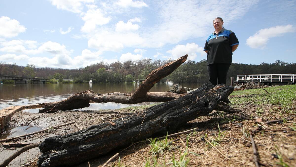 Lynette Hunter from Nelligen at the Clyde River, where flooding in February 2020 inundated areas recently burned by bushfires. PICTURE: ADAM McLEAN.