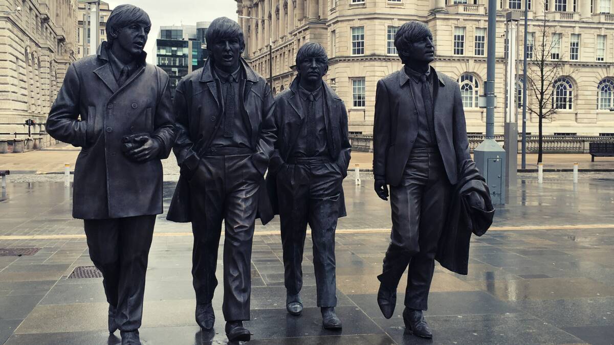 Paul McCartney and his Beatle mates - cast in bronze - in Liverpool. File picture