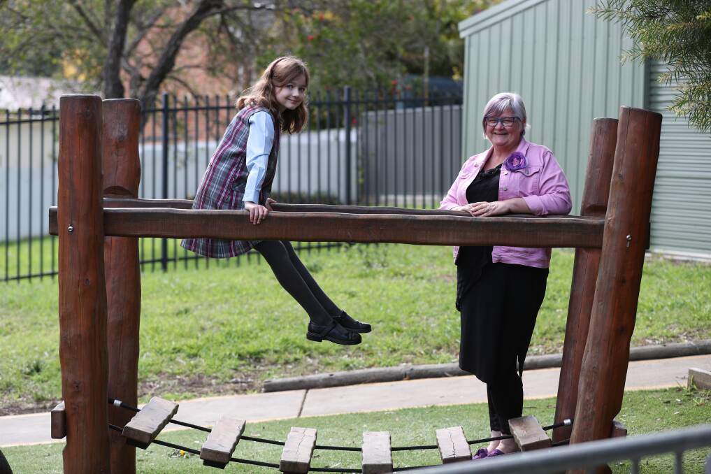 Mount St Thomas Public School student Philippa Collins and teacher Megan Abba were among the dozens of people involved with the design of new playgrounds. Picture by Robert Peet