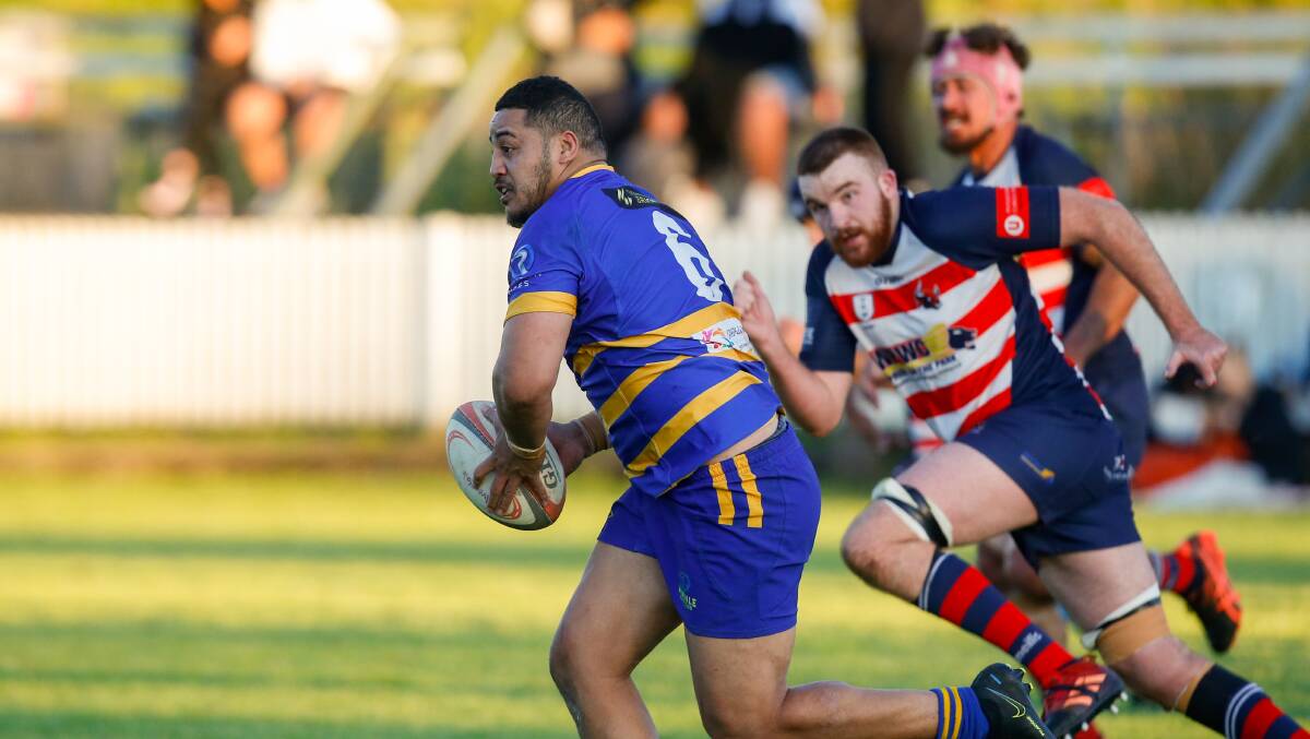 RUGBY OFF: It was all sun and fun last week when Avondale's Tu'umuliilevao Taiti-Taanoa took on the University defence last weekend. Picture: Anna Warr