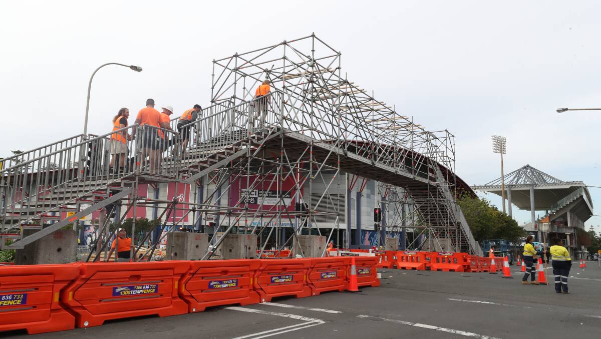 Workers have started the dismantling of infrastructure across Wollongong in place for the 2022 Road World Championships. Picture by Robert Peet.