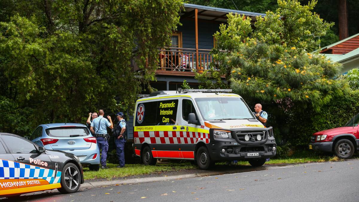 WOMAN HOSPITALISED: Emergency services on the scene in Austinmer on Saturday. Photo: Wesley Lonergan