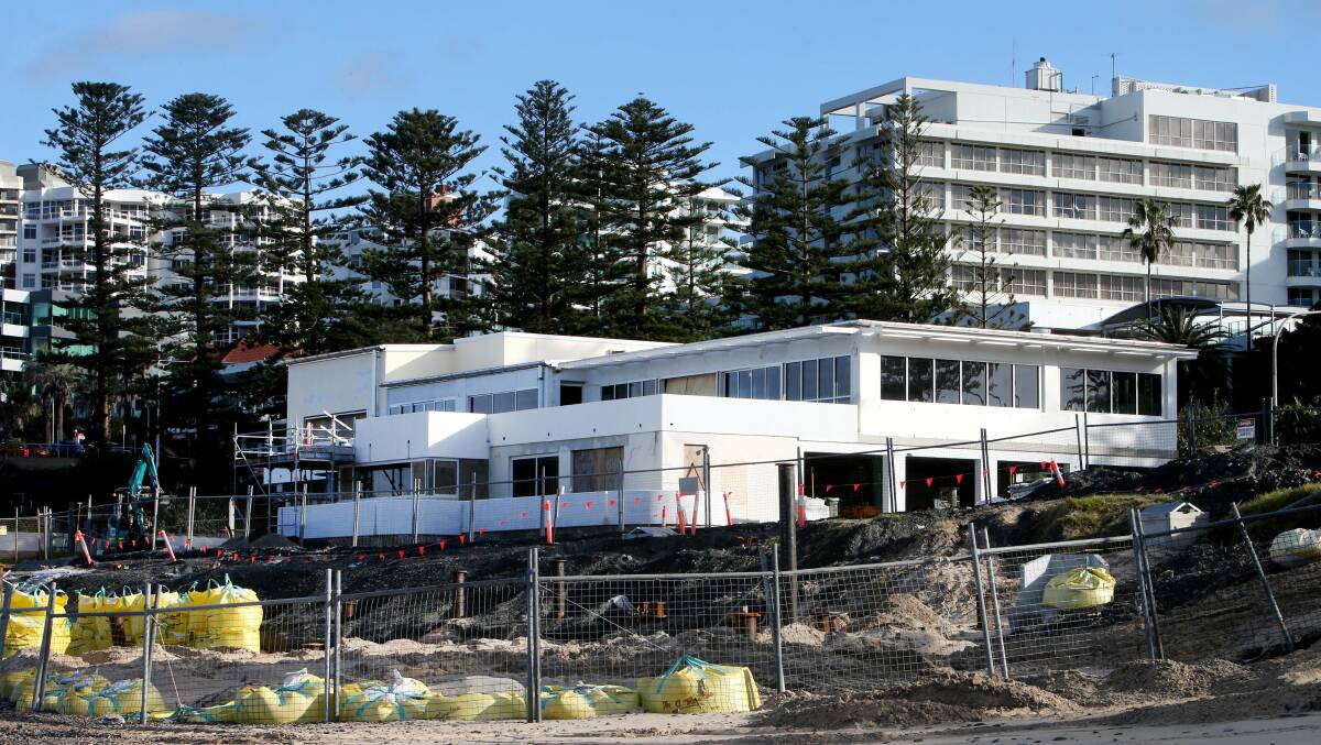 Coming on: The fence is still up on North Wollongong Surf Club's renovations. Picture: Sylvia Liber.