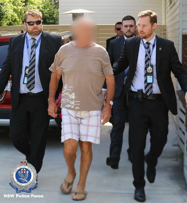 Queensland Police arrest Chris Dawson in at a home on the Gold Coast on Wednesday morning. CREDIT: NSW Police Force.