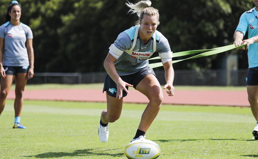 Moving target: Wollongong rugby sevens star Emma Tonegato will have to wait a year to defend the gold medal she won in Rio de Janeiro. Picture: Rugby Australia/Karen Watson.