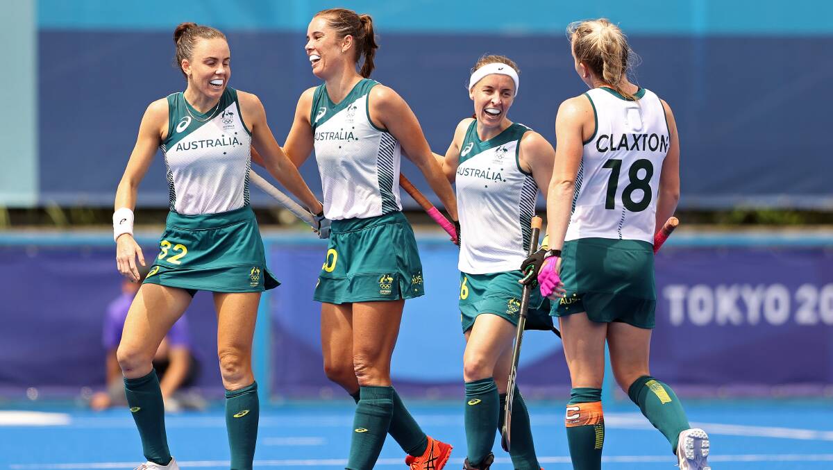 Successful afternoon: Grace Stewart and the Hockeyroos celebrate a goal during Monday's win over China. Picture: Francois Nel/Getty Images