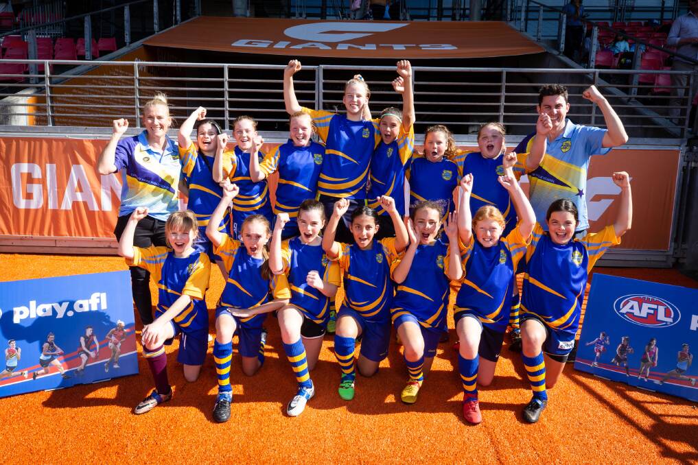 All smiles: The Lindsay Park girls Australian football team at the Paul Kelly Cup. Picture: Supplied.