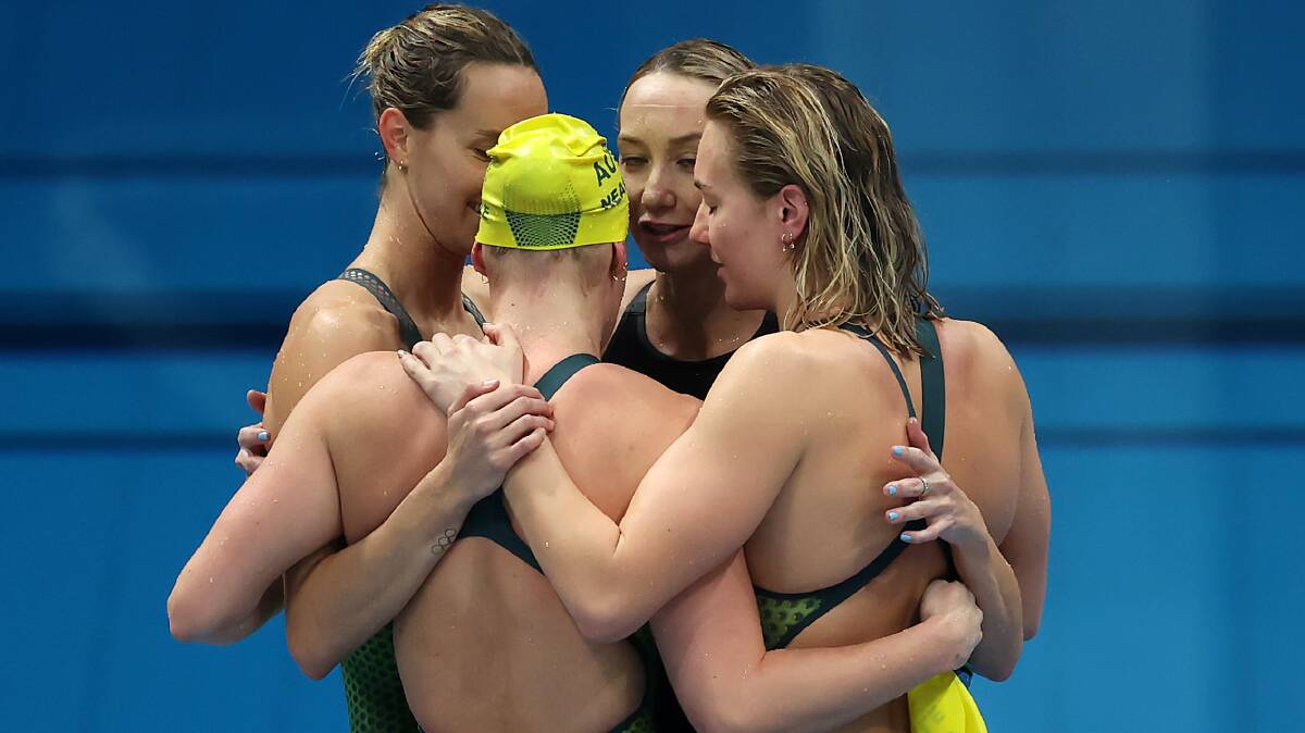 Olympic medalists: The Australian 4x200m relay team react after winning bronze on Thursday. Picture: Alexander Hassenstein/Getty Images