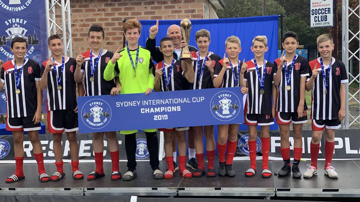 Winners are grinners: The Illawarra Football Academy Under 13 boys side. Picture: Mark Tyssen.
