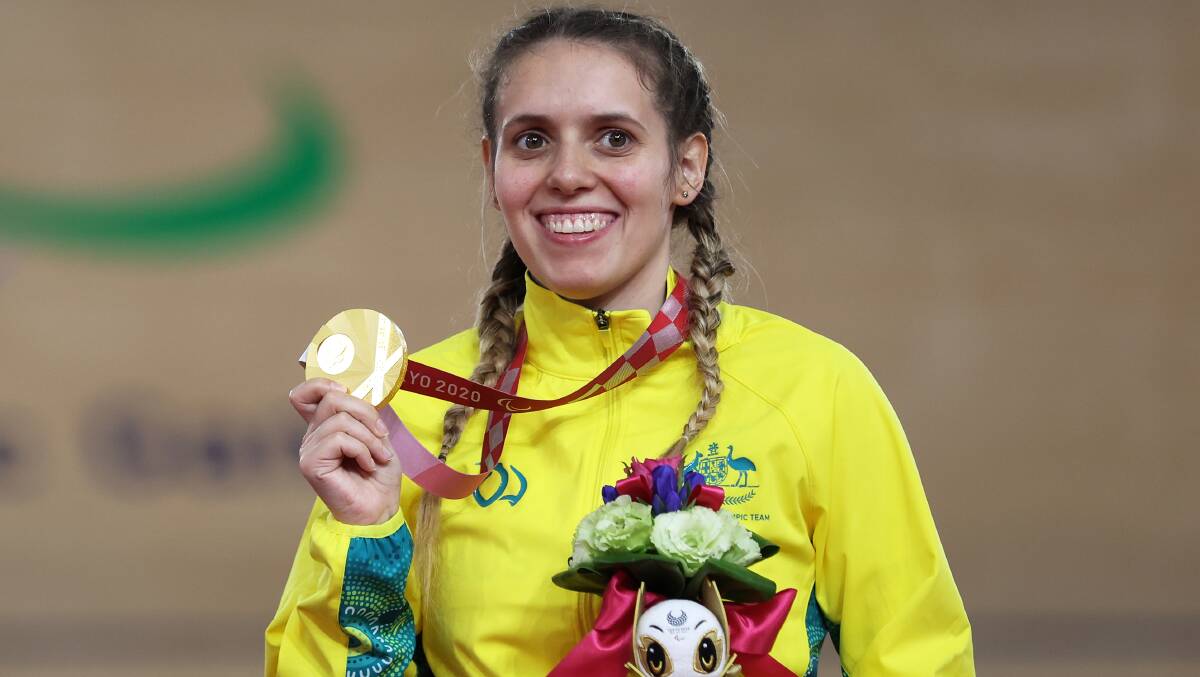 Golden glow: Amanda Reid celebrates her victory at the Paralympic Games. Picture: Kiyoshi Ota/Getty Images