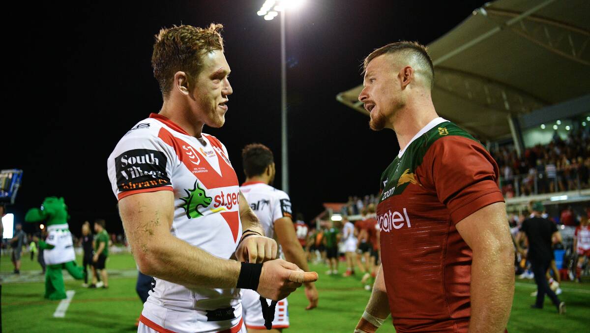 Reunion: Cameron McInnes and Damien Cook. Picture: NRL Imagery.