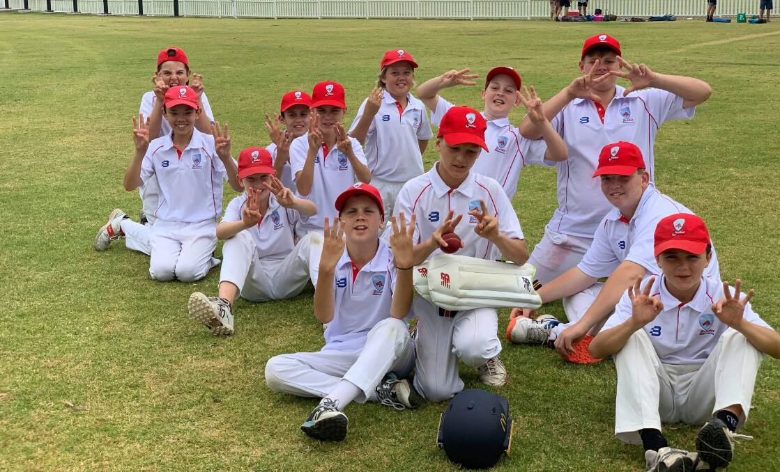 Winners are grinners: The Illawarra under 12 cricket side celebrate their third-straight victory. Picture: Cricket Illawarra.