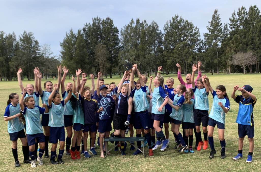 Winners: Shell Cove students celebrate their victory in the NSW PSSA Knockout South Coast finals.
