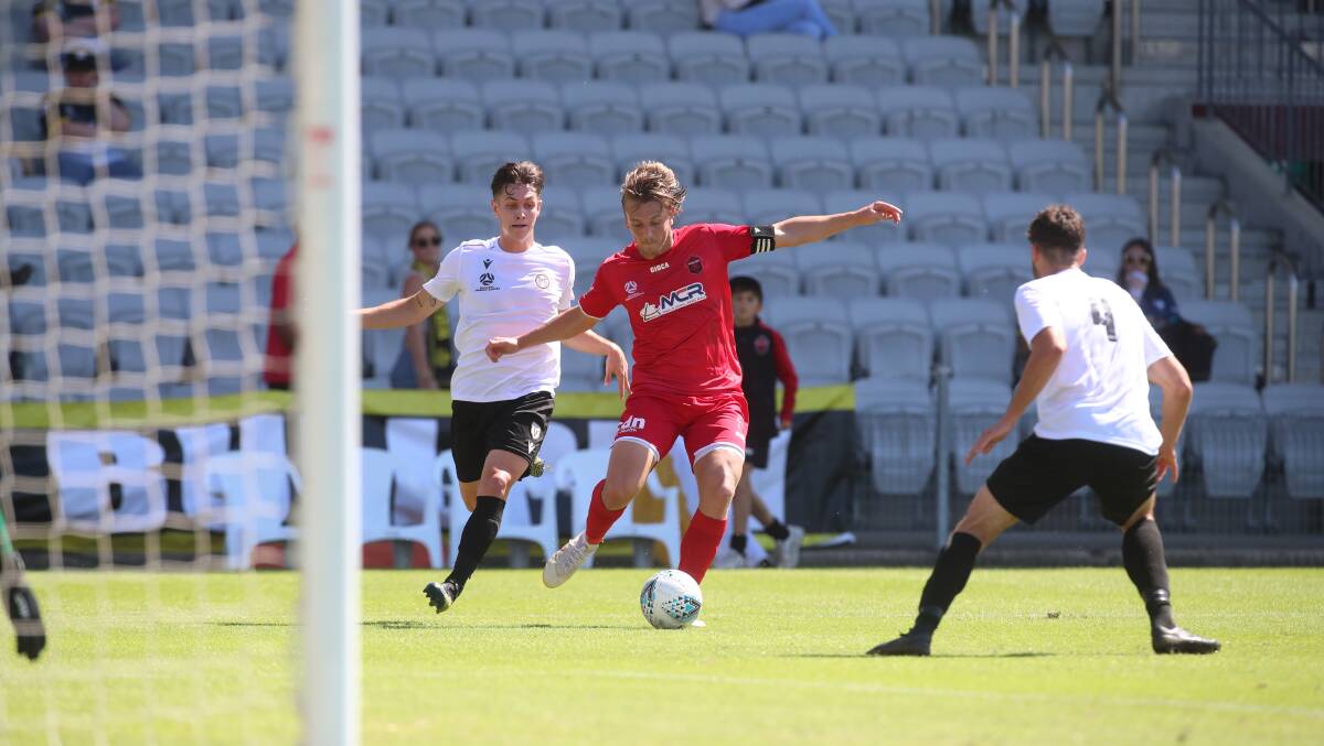 Attacking mindset: Wollongong Wolves striker Lachlan Scott on Sunday afternoon. Picture: Sylvia Liber