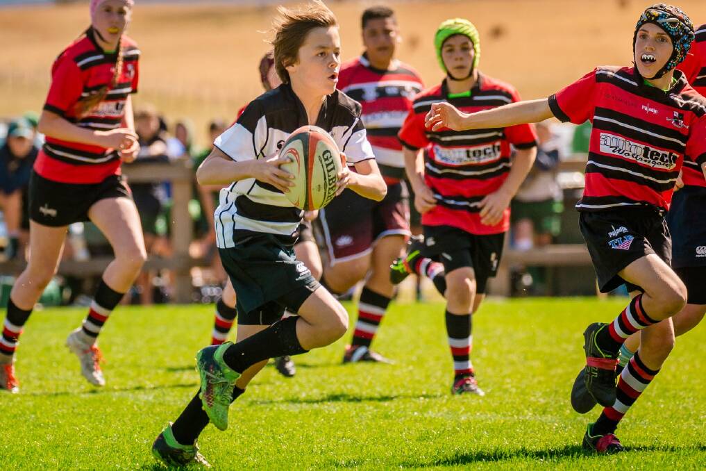 Winning run: The Kiama under 13s edged Tech Tahs in a tight Illawarra grand final on Sunday. Picture: Illawarra Junior Rugby Union.