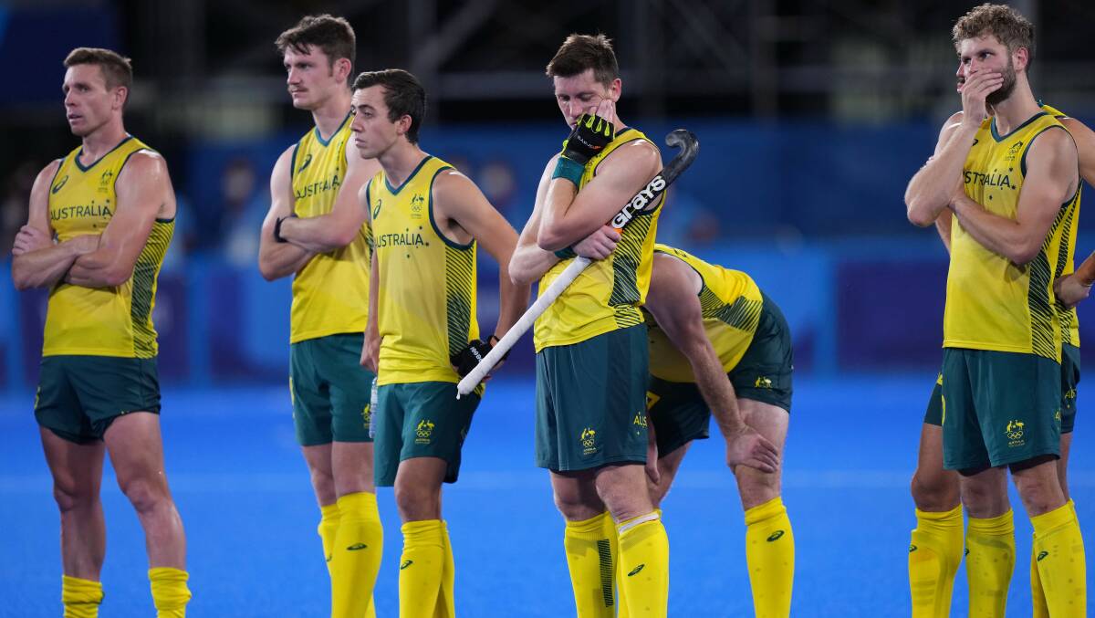 Devastation: The Kookaburras react after losing Thursday's gold-medal match in a shootout. Picture: Joe Giddens/AAP