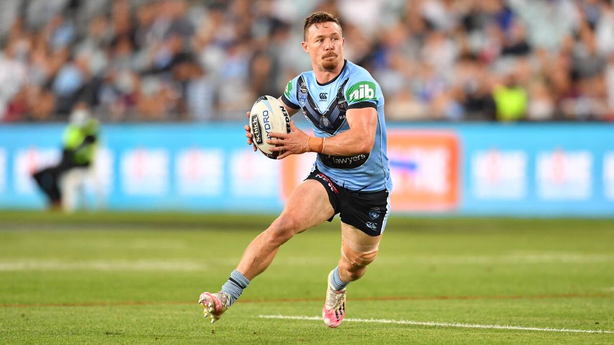 On the run: Damien Cook. Picture: NRL Imagery.
