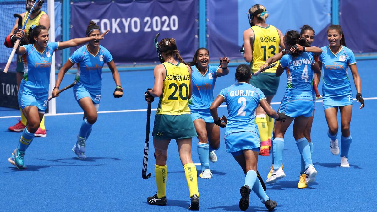 Jubilation: India celebrate their match-winning goal over Australia in Monday's quarter-final. Picture: Buda Mendes/Getty Images
