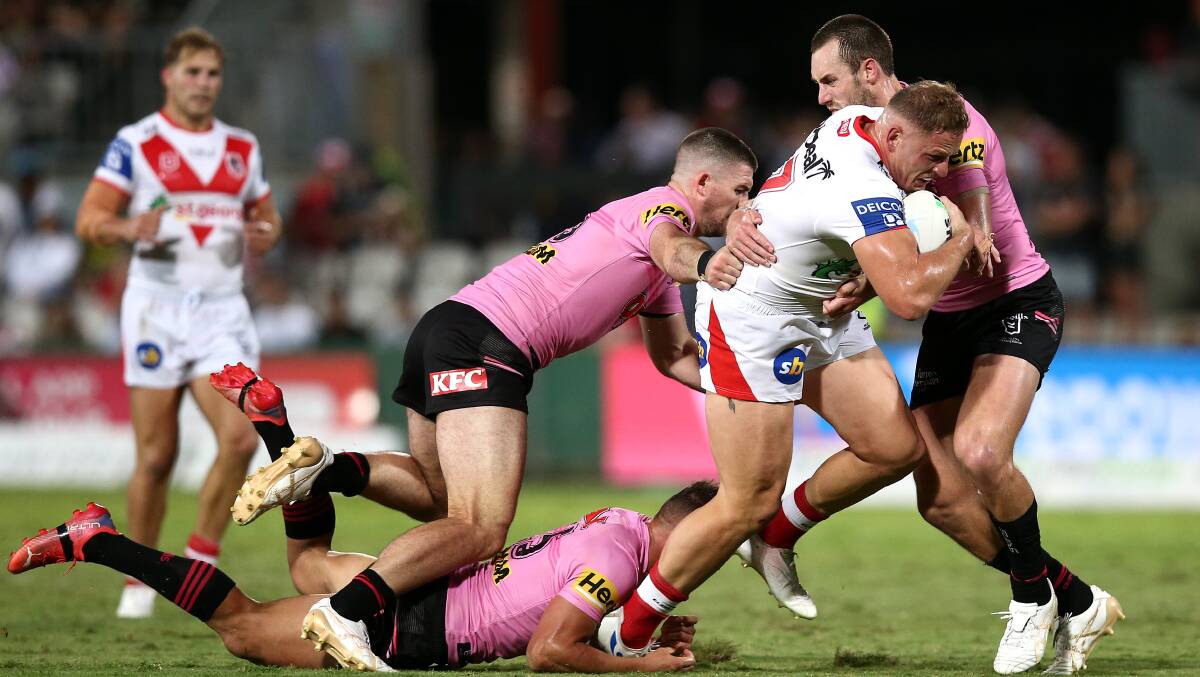 On the charge: George Burgess in his NRL return on Friday night. Picture: Getty Images